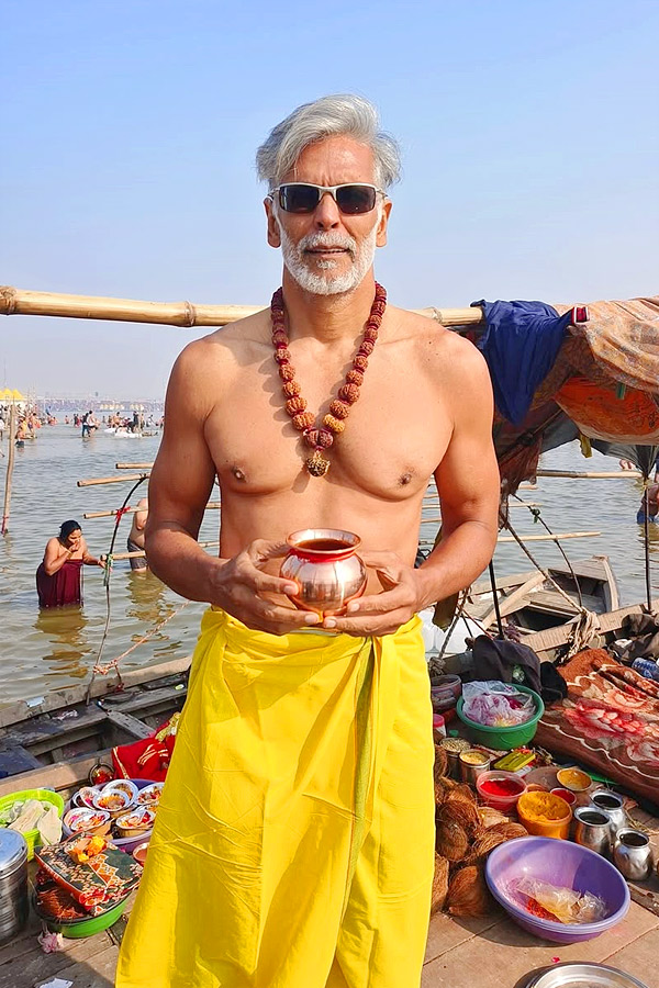 Milind Soman takes holy dip with wife Ankita Konwar at Maha Kumbh Mela Photos15