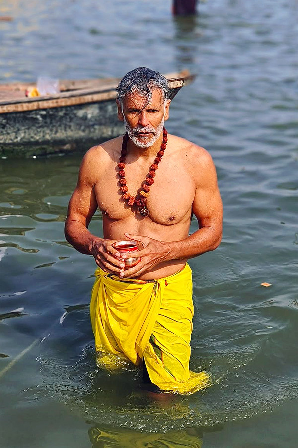 Milind Soman takes holy dip with wife Ankita Konwar at Maha Kumbh Mela Photos18