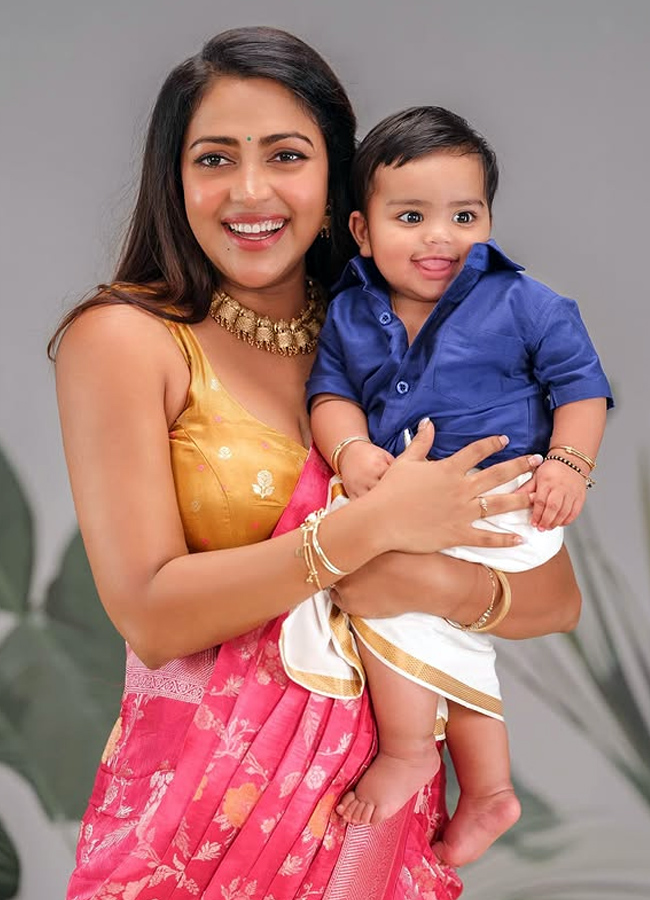 How cute he is Amala Paul looking at her son2