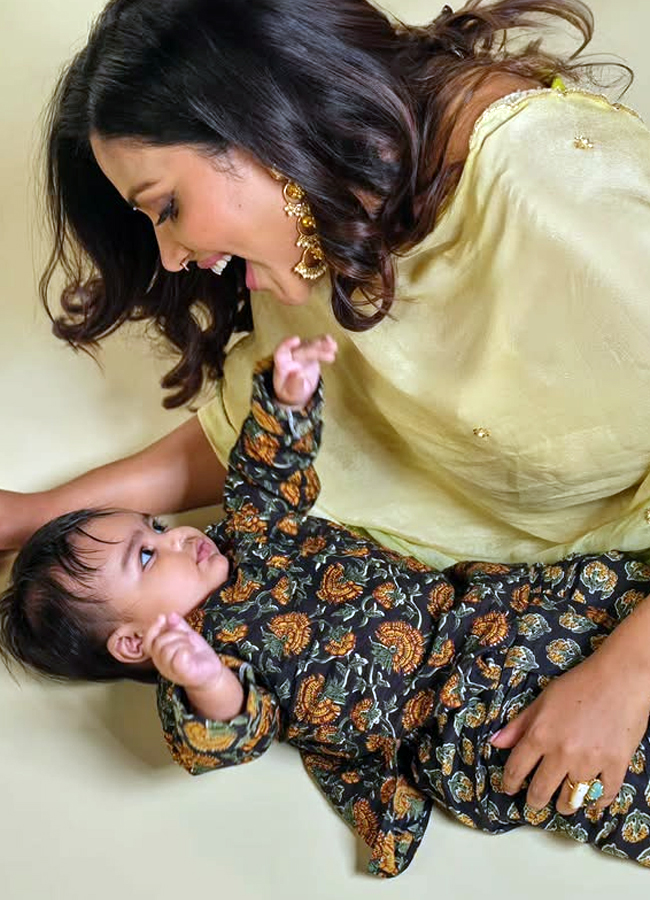 How cute he is Amala Paul looking at her son14