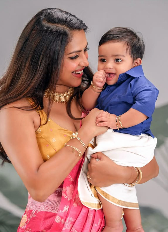 How cute he is Amala Paul looking at her son3