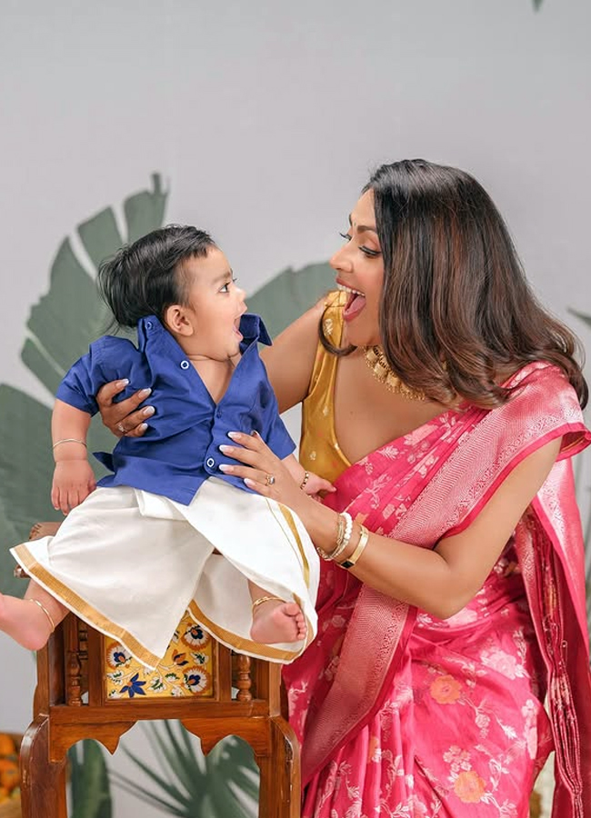 How cute he is Amala Paul looking at her son5