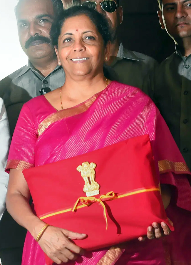 indian finance minister Nirmala sitharaman cream gold saree with madhubani boder budget 2025 to 20262