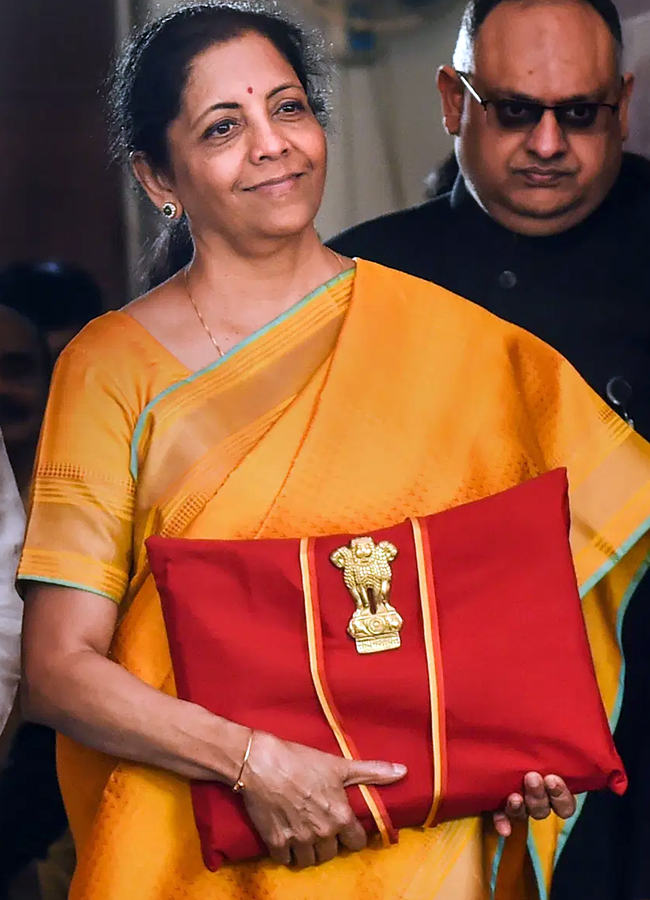 indian finance minister Nirmala sitharaman cream gold saree with madhubani boder budget 2025 to 20263