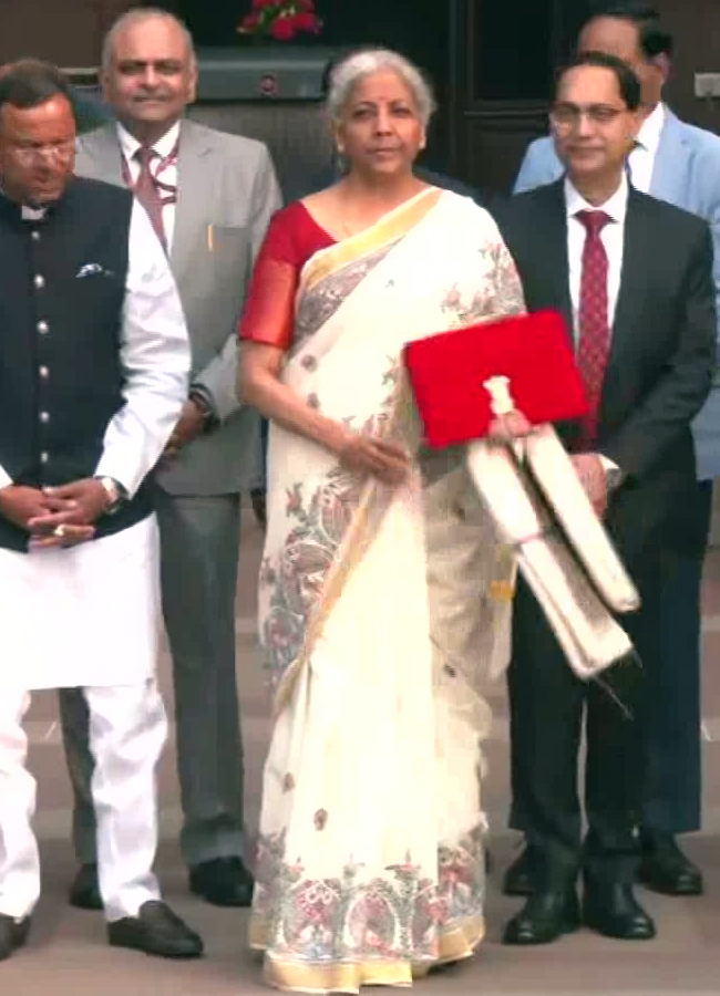 indian finance minister Nirmala sitharaman cream gold saree with madhubani boder budget 2025 to 20269