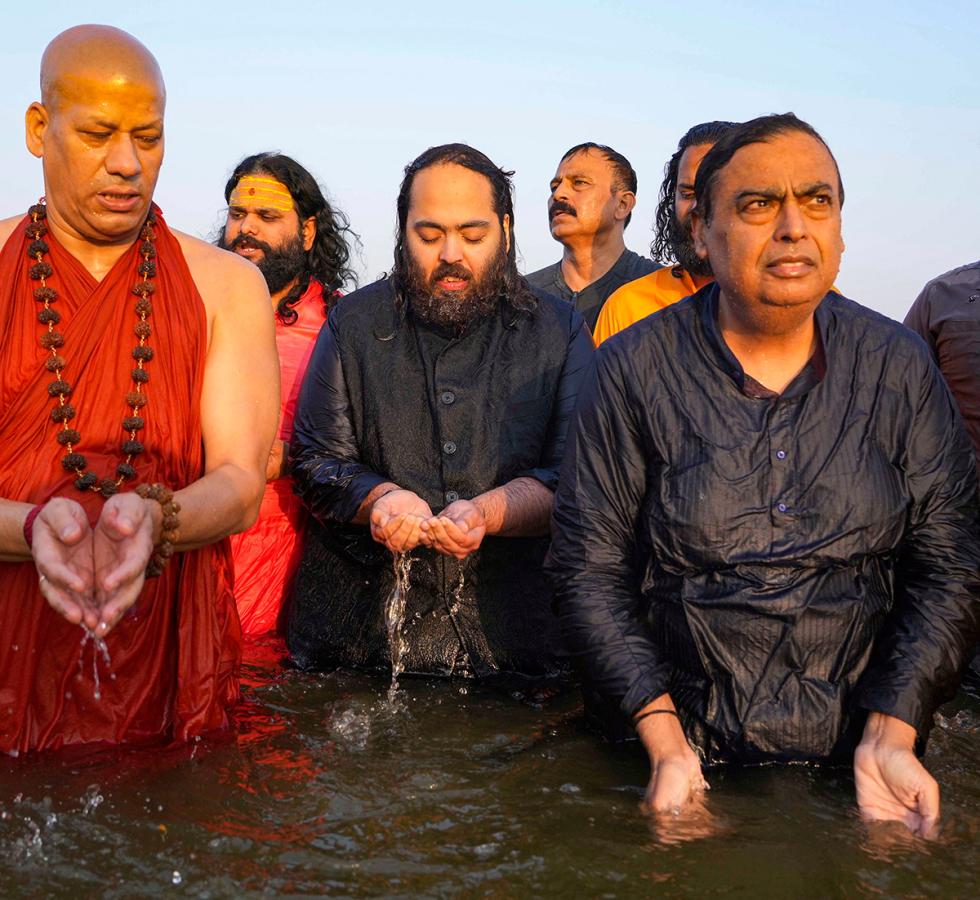 Reliance Chairman Mukesh Ambani Family in Maha Kumbh Mela 2025 Photos9