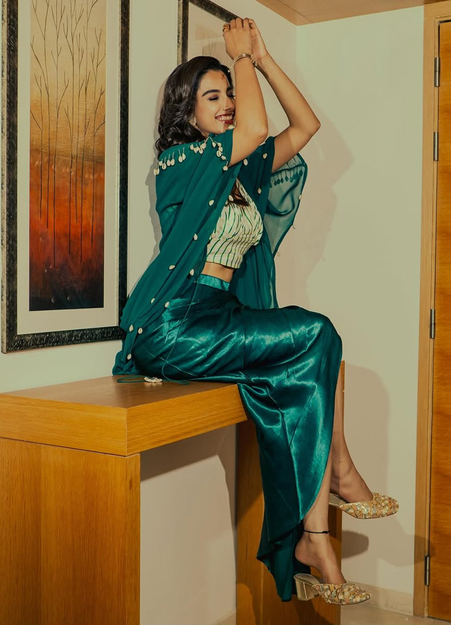 Meenakshi Chaudhary beautiful look in green dress3