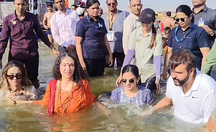 Isha Ambani Takes A Holy Dip At Maha Kumbh Mela In Prayagraj Photos3