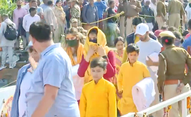 Isha Ambani Takes A Holy Dip At Maha Kumbh Mela In Prayagraj Photos6