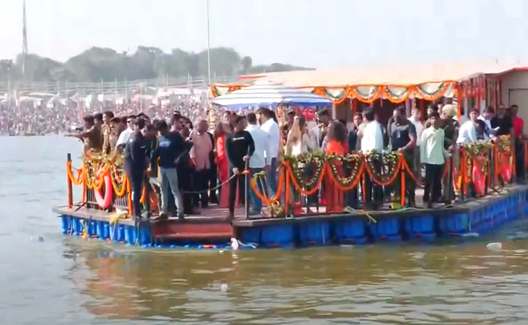 Isha Ambani Takes A Holy Dip At Maha Kumbh Mela In Prayagraj Photos9