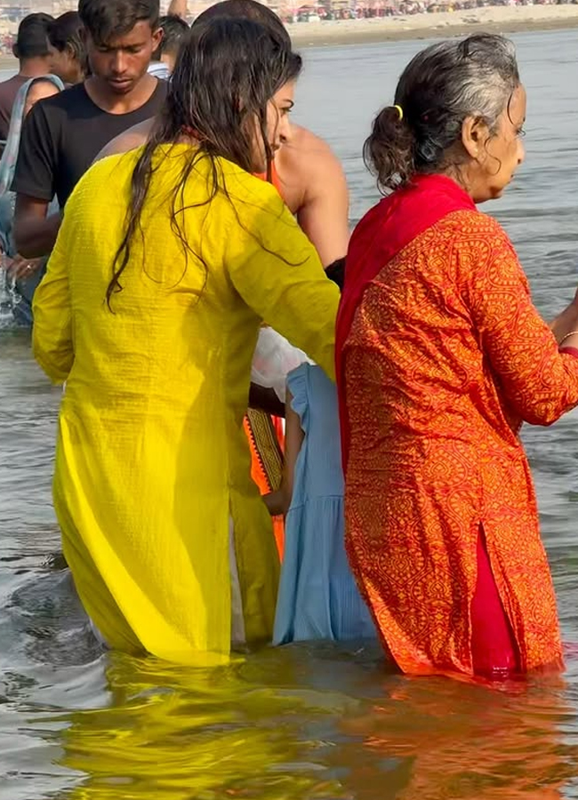 Former Indian bowler Ashok Dinda takes a holy dip in Mahakumbh5