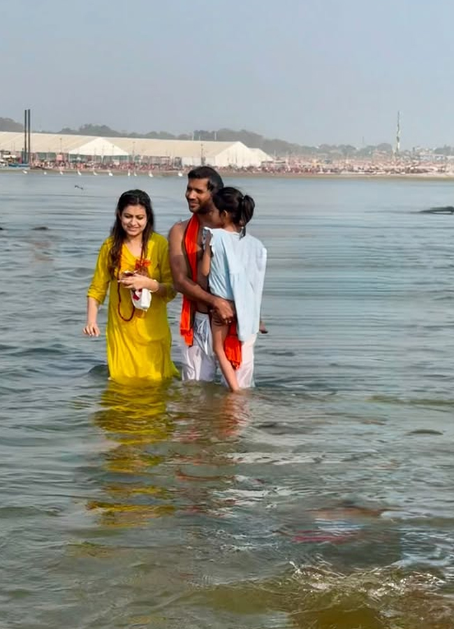 Former Indian bowler Ashok Dinda takes a holy dip in Mahakumbh7