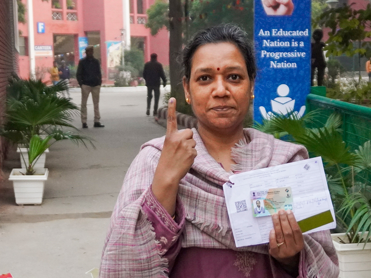 Polling booth during the Delhi Assembly elections in New Delh Photos24