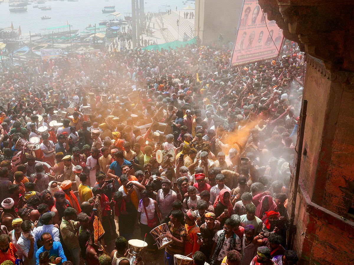 Photos Of Hindu devotees celebrate Holi With Bhasma In Varanasi13