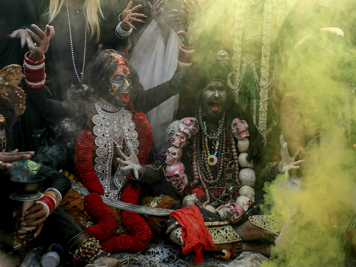 Photos Of Hindu devotees celebrate Holi With Bhasma In Varanasi16