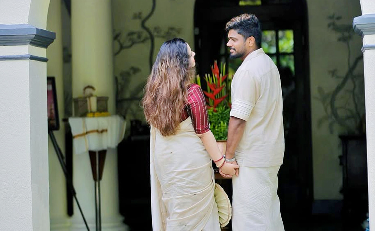 Sanju Samson celebrates Onam with wife Charulatha Photos4