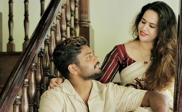 Sanju Samson celebrates Onam with wife Charulatha Photos5