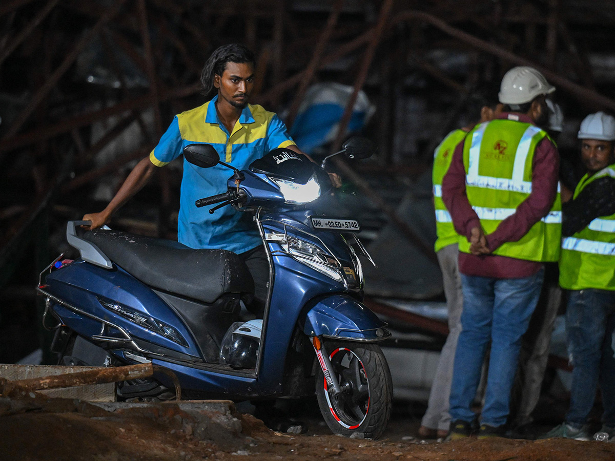 Massive Dust Storm, Season's First Rain In Mumbai Photos33