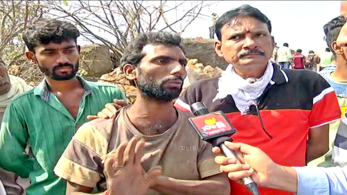 Man Trapped in Rock Cave At Nizamabad - Sakshi