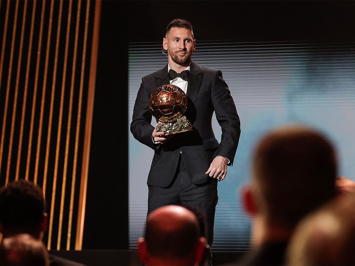 Lionel Messi poses prior to the 2023 Ballon dOr France Football award ceremony - Sakshi