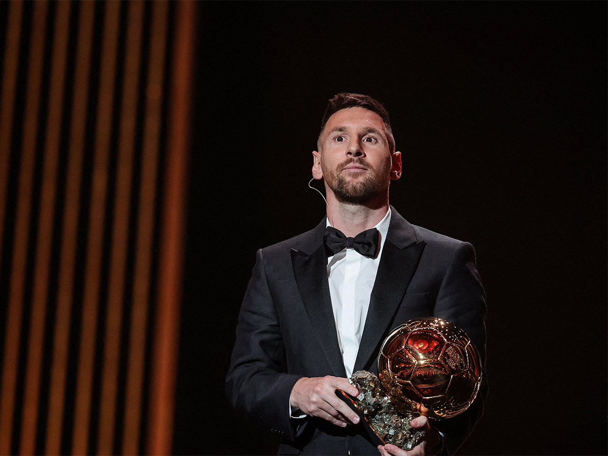 Lionel Messi poses prior to the 2023 Ballon dOr France Football award ceremony - Sakshi
