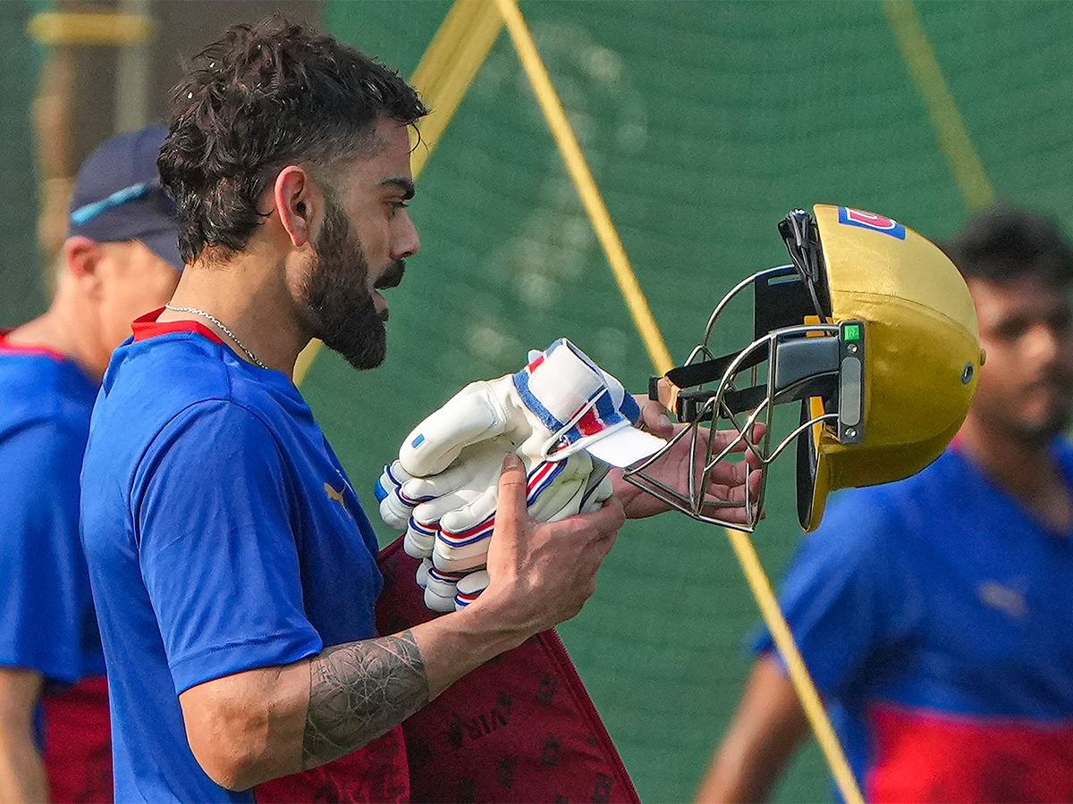 Virat Kohli during a training session ahead of the Indian Premier League - Sakshi