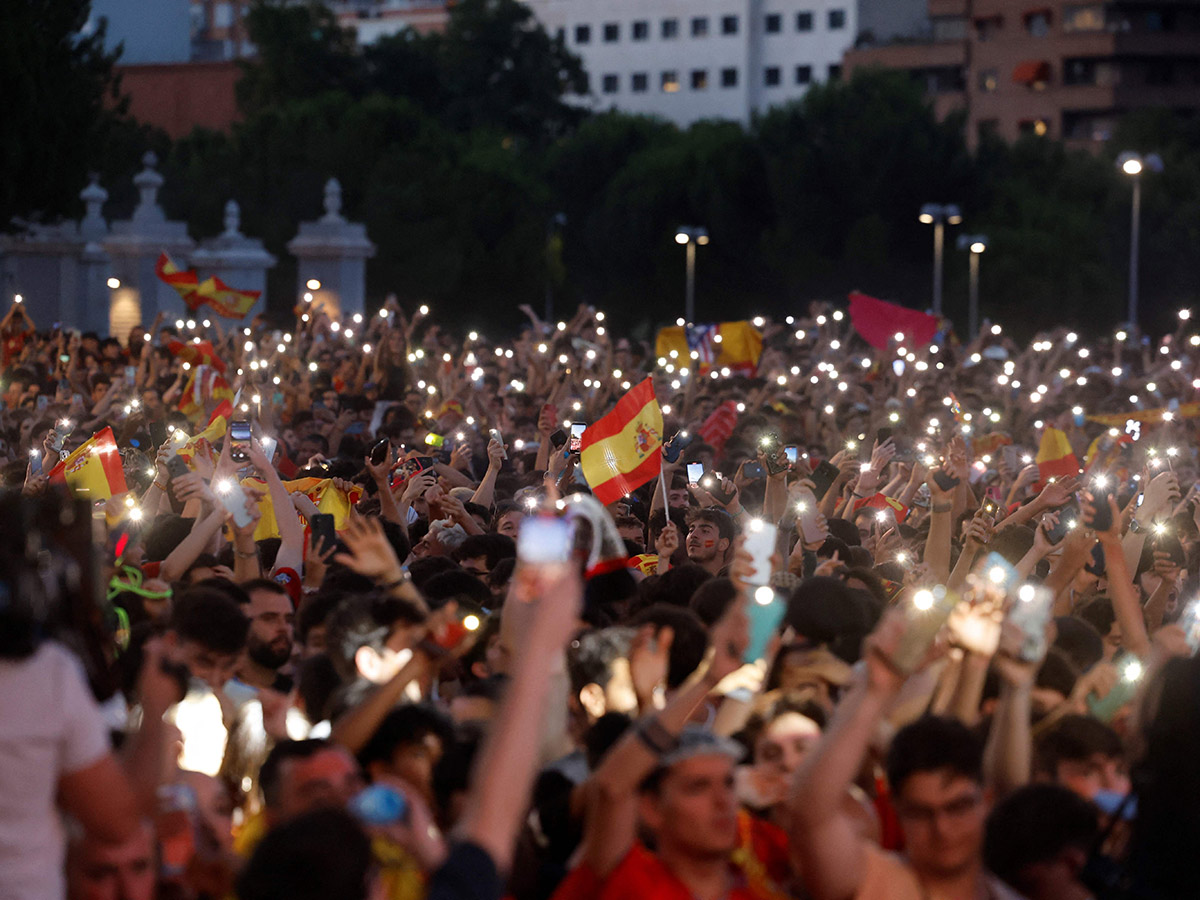 Fans celebrate after Spain's royal welcome in Madrid: Photos