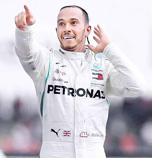 Lewis Hamilton storms to German Grand Prix victory as Vettel crashes out - Sakshi