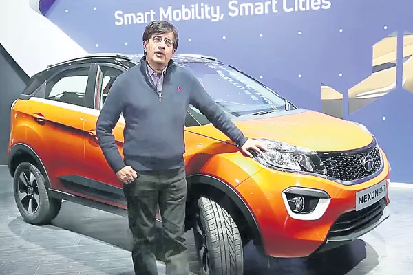 Tata Motors plans to roll out 10-12 new passenger vehicles - Sakshi