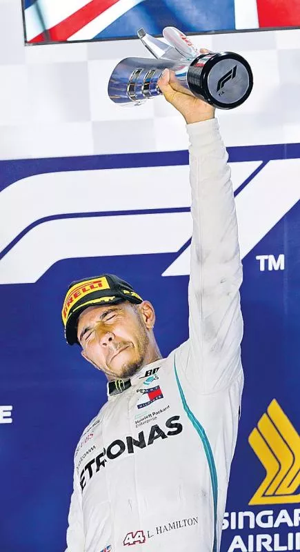 Lewis Hamilton wins Singapore Grand Prix to extend lead in F1 title race - Sakshi