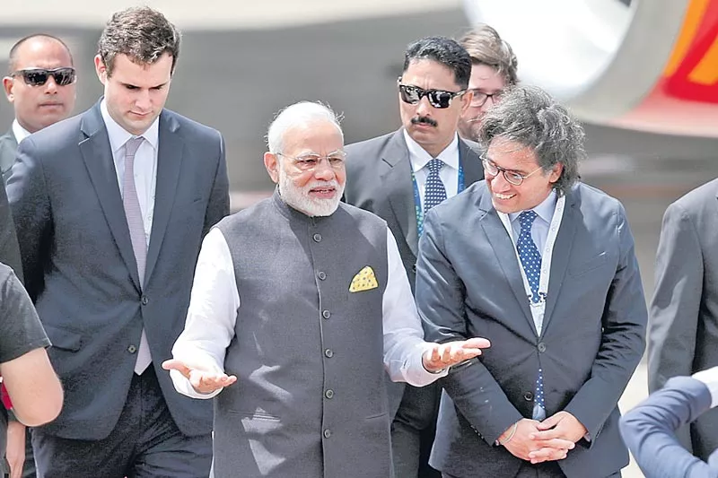 Narendra Modi arrives in Argentina for G20 summit - Sakshi