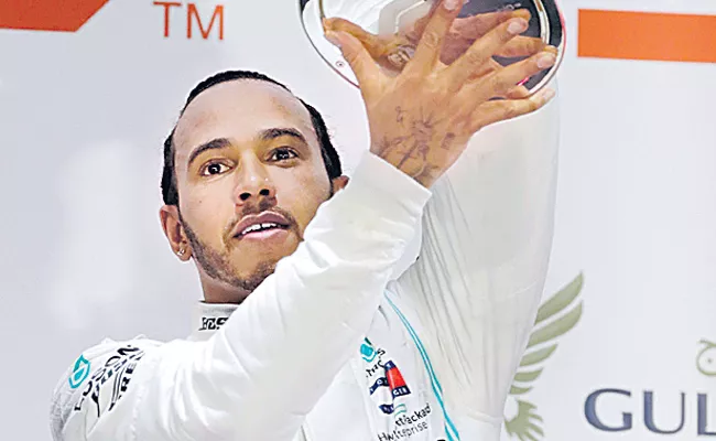 Lewis Hamilton wins in Bahrain after Charles Leclerc loses - Sakshi