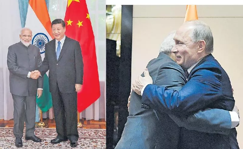PM Modi meets Xi Jinping, Vladimir Putin and Ashraf Ghani at Bishkek - Sakshi