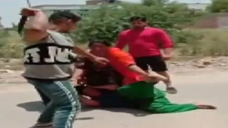 In Punjab Brother of Congress Councillor Aides Thrash Woman Over Money Issue - Sakshi