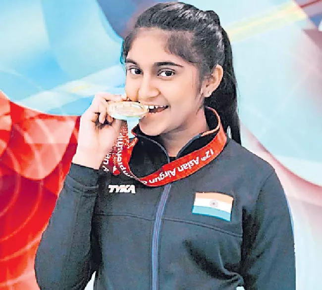 Anish wins 25m rapid fire pistol gold silver for Esha at Junior World Cup - Sakshi