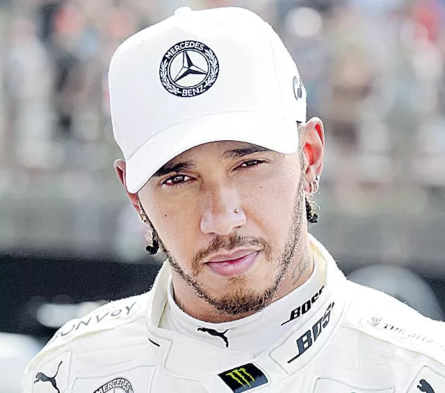 Lewis Hamilton determined to contest German Grand Prix - Sakshi