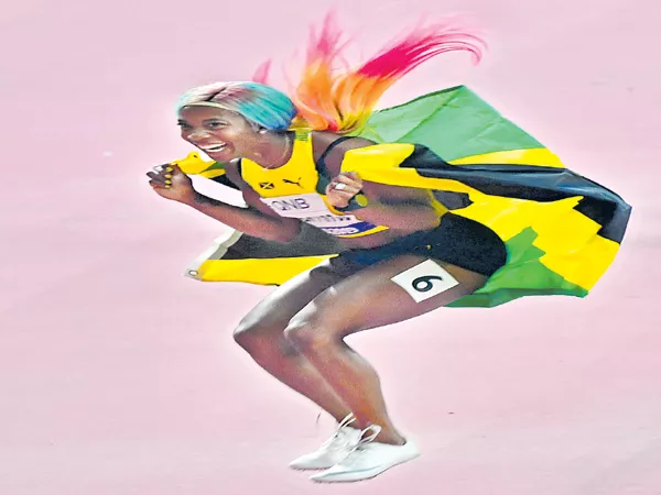 Shelley Ann wins 4th gold medal in World Athletics Championship - Sakshi