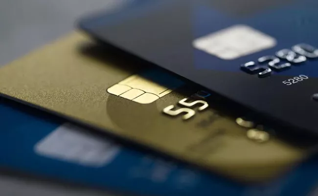  RBI allows users to enable disable credit debit cards modify usage limit - Sakshi