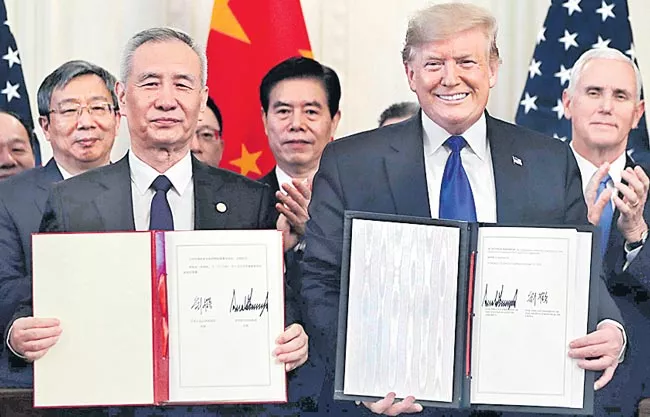 Donald Trump, China's Liu He sign first phase of new trade deal - Sakshi