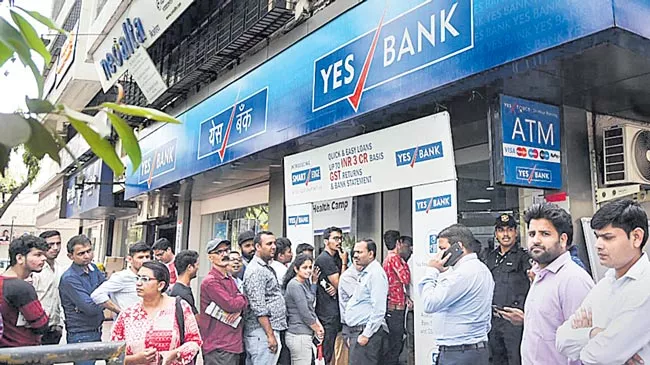 RBI withdraws moratorium on Yes Bank - Sakshi