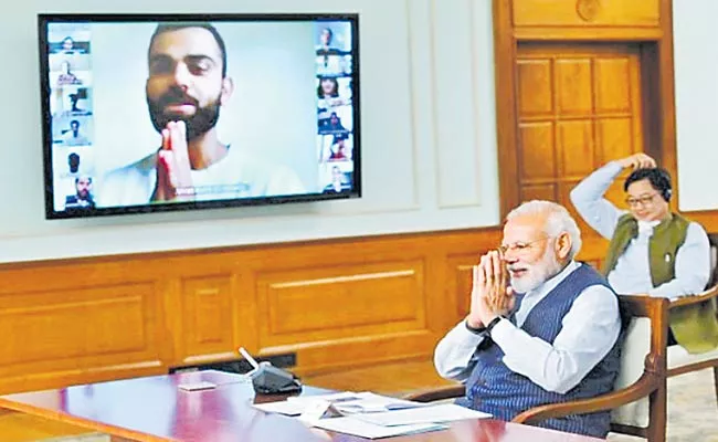Narendra Modi video Conference with Indian Players - Sakshi