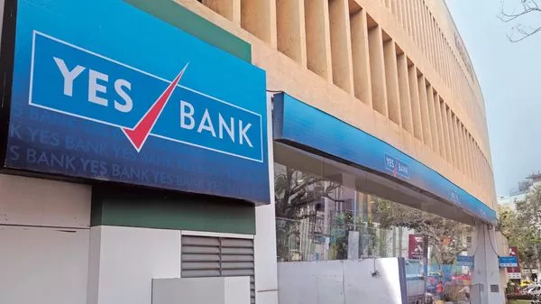 Yes Bank share tumbles again - Sakshi