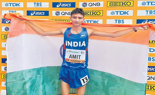 Amit Khatri wins silver in 10km race walk at U-20 Worlds - Sakshi