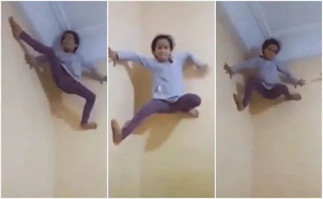 Viral Video: Little Girl Climbs Wall Like Spider Man - Sakshi