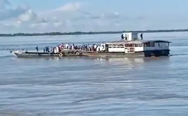 2 Boats With 100 Passengers Collide In Brahmaputra River In Assam - Sakshi