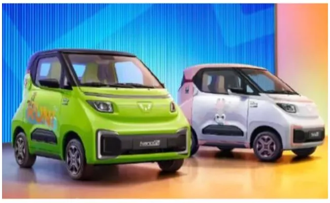 Chinese carmaker Wuling Hong Guang design World cheapest electric car - Sakshi