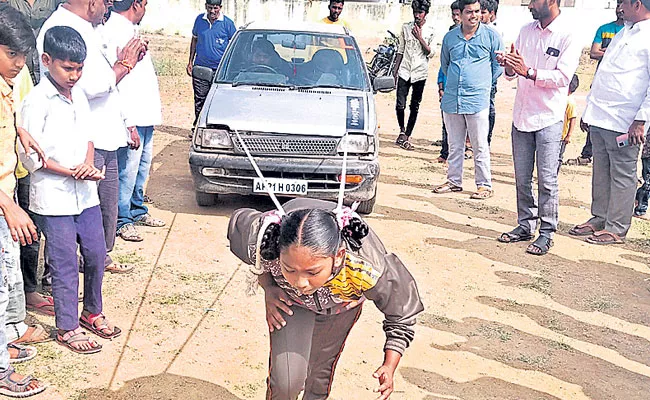 Markapur: 6th Class Girl Pulls Car with Her Hair in Prakasam District - Sakshi