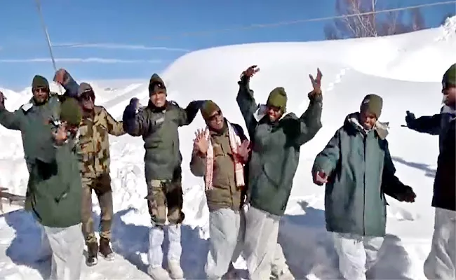 BSF Troops Dance and Celebrate Bihu at Freezing Temperature Kashmir - Sakshi
