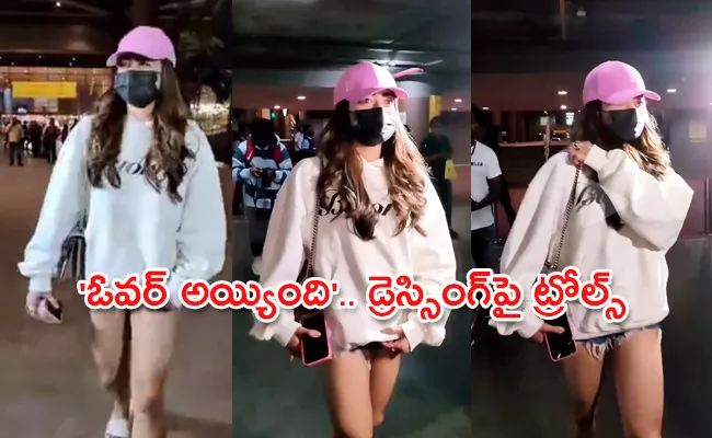 Viral: Rashmika Mandanna Spotted In Airport, Fans Trolls On Her Dress Sense - Sakshi