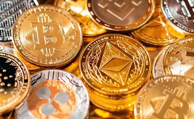 No plans to introduce cryptocurrency: Govt - Sakshi